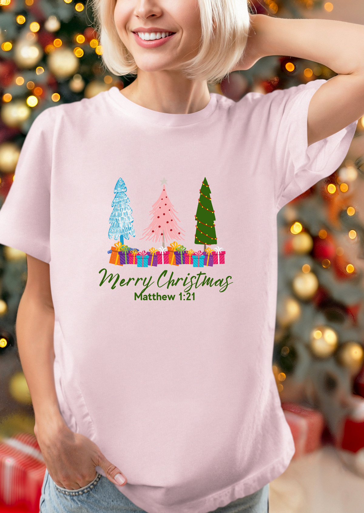 3 Christmas trees, Pink Christmas tree, Blue Christmas tree, Green Christmas tree.  Gifts under trees.  Words "Merry Christmas"