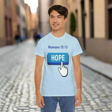 Person wearing a white t-shirt with a blue 'HOPE' button graphic and text 'Romans 15:13'.