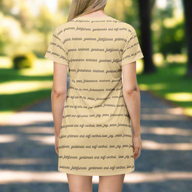 Beige t-shirt dress with text of fruits of the spirit worn by a woman