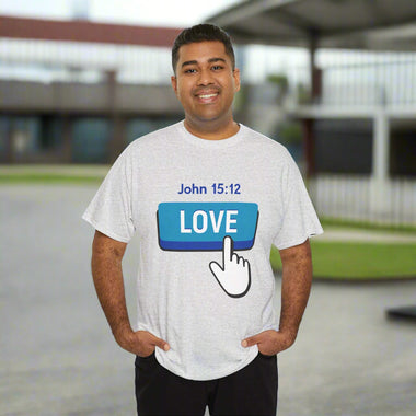 Man wearing a white t-shirt with a graphic design love button and John 15:12 text on a white background