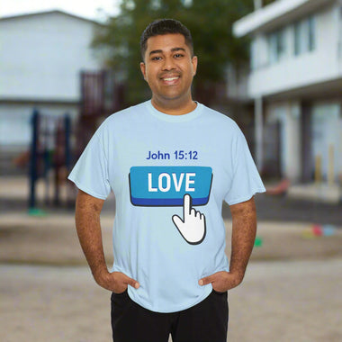 Man wearing a white t-shirt with a graphic design love button and John 15:12 text on a white background