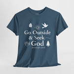 Indigo blue t-shirt with white text and nature-themed graphics on a light gray background