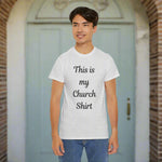 Person wearing a gray t-shirt with 'This is my Church Shirt' text 