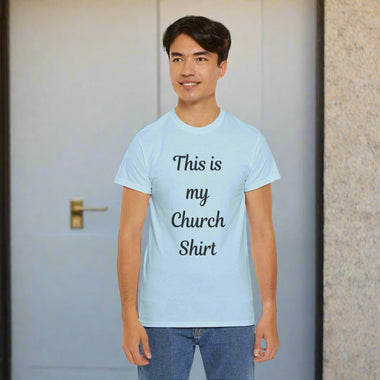 Person wearing a black t-shirt with 'This is my Church Shirt' text