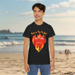 Person wearing a black t-shirt with a red heart and flame graphic and text Heart of Fire for God