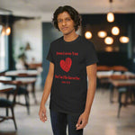 Person wearing a black t-shirt with red Jesus Loves You But I'm His Favorite text and heart graphic