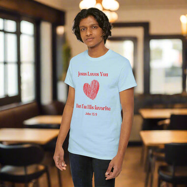Person wearing a black t-shirt with red Jesus Loves You But I'm His Favorite text and heart graphic
