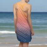 Woman wearing a sleeveless dress with text design