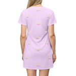 Person wearing a light purple t-shirt dress with text and logo on a white background