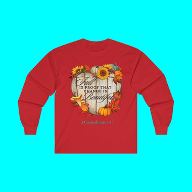 White long-sleeve tee shirt with autumn-themed design says "Fall is Proof that Change is Beautiful"
