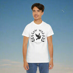 Person wearing a white t-shirt with a black dove and leaves