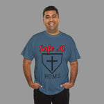 Man wearing a blue t-shirt with 'Safe At Home' text and a cross symbol on a gray background