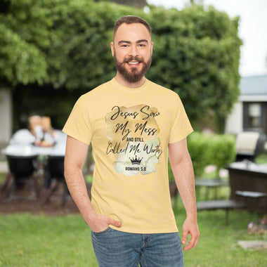 Man wearing a yellow t-shirt with Jesus Saw My Mess and still Called Me Worthy Romans 5:8 on the front