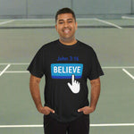 Man wearing a black t-shirt with 'BELIEVE' text and blue button graphic