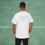 Person wearing a white t-shirt with a blue text of John 3 verse 16 design on the back