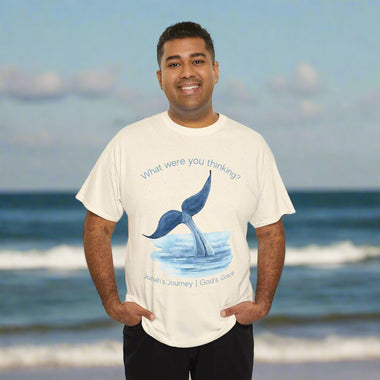 Man wearing a white t-shirt with a whale tail graphic and text What were you thinking